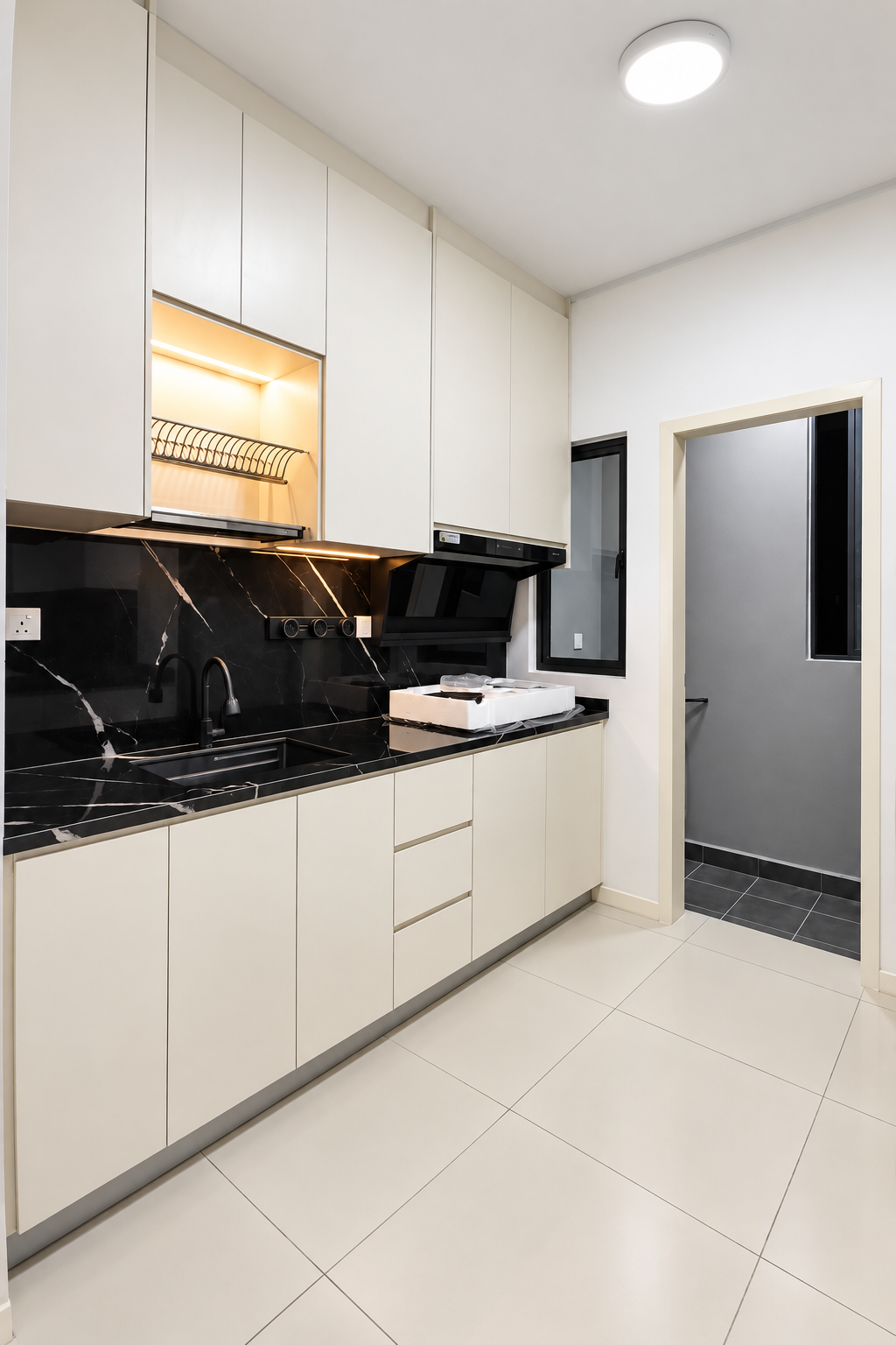 Completed kitchen with white built-in cabinetry at Vierra Residence